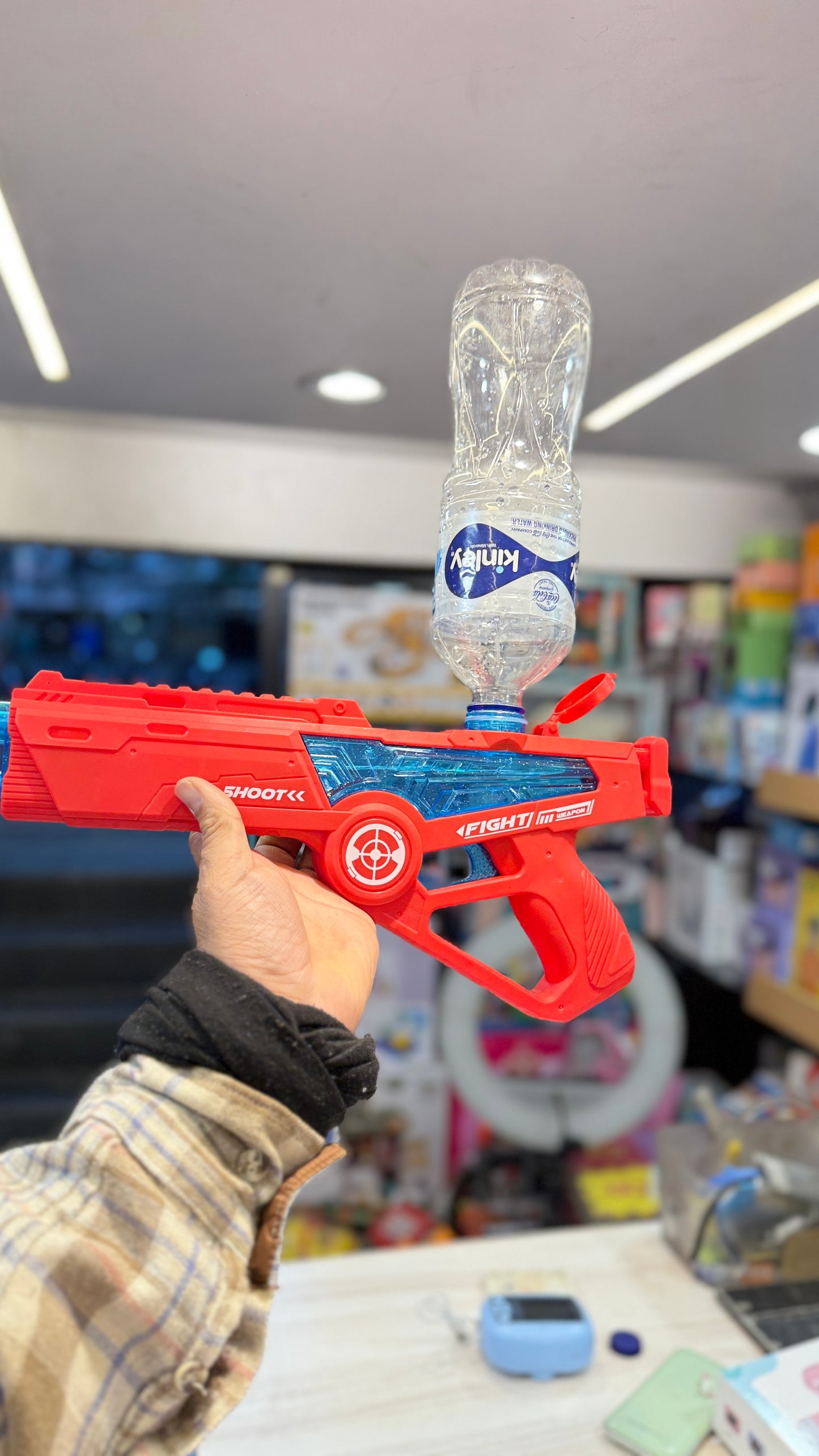 Auto suction Watergun with rechargeable battery - mineral water bottle connectivity