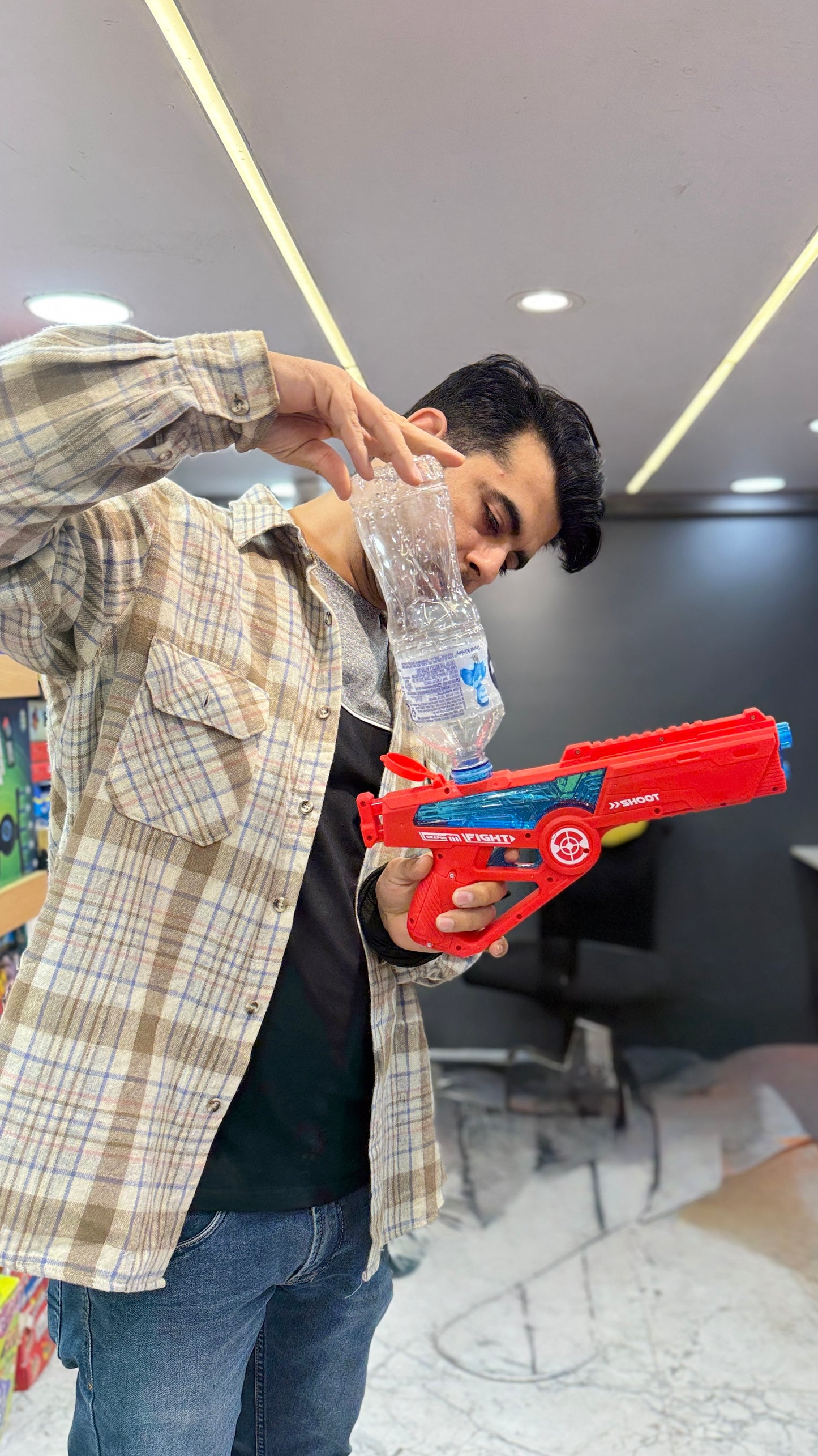 Auto suction Watergun with rechargeable battery - mineral water bottle connectivity